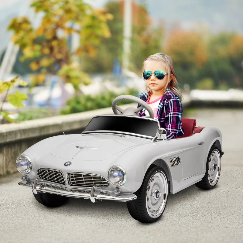 HOMCOM Macchina Elettrica per Bambini a 2 Porte con Licenza BMW 507, con Clacson e Telecomando, 115x55x47 cm, Bianca