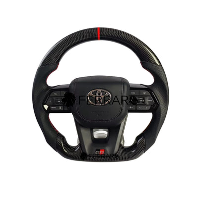 (PRENOTA) Volante per Toyota, Carbonio Diagonale, Taglio, Filo Nero, Foratura, Etichetta Rossa